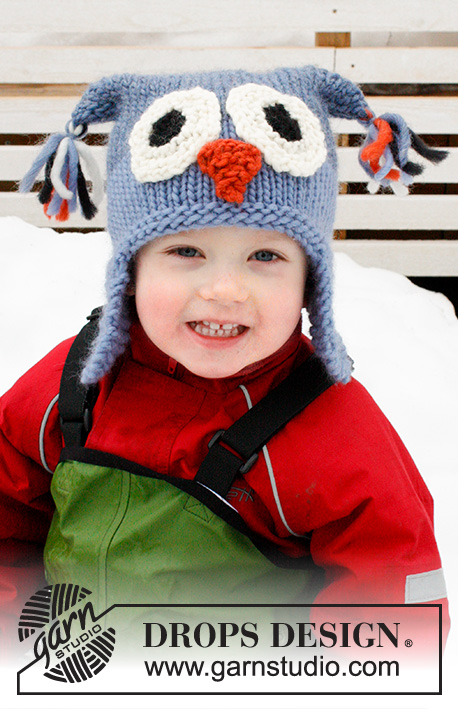 Otis / DROPS Extra 0-1017 - Stickad mössa med uggla till barn i DROPS Snow. Arbetet stickas med öronlappar. Storlek 2-12 år.