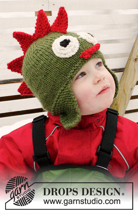 Rhaegal / DROPS Extra 0-1018 - Gestrickte Drachen - Mütze für Kinder in DROPS Alaska mit Ohrenklappen. Größe 3-12 Jahre.