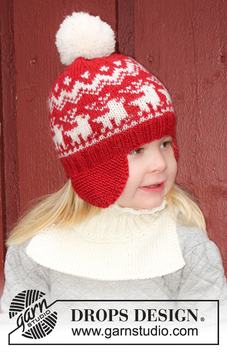 Prancing Around / DROPS Extra 0-1048 - Knitted hat, mittens and neck warmer for children in DROPS Karisma. Pieces are worked with Nordic pattern with reindeer. Size 3 - 14 years. Theme: Christmas