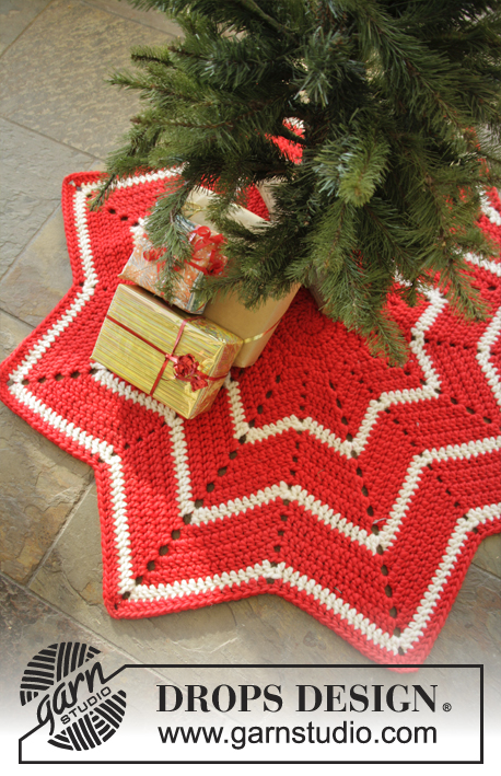 Under the Christmas Tree / DROPS Extra 0-1050 - Crochet star shaped carpet with stripes and zig-zag pattern in DROPS Snow. Theme: Christmas