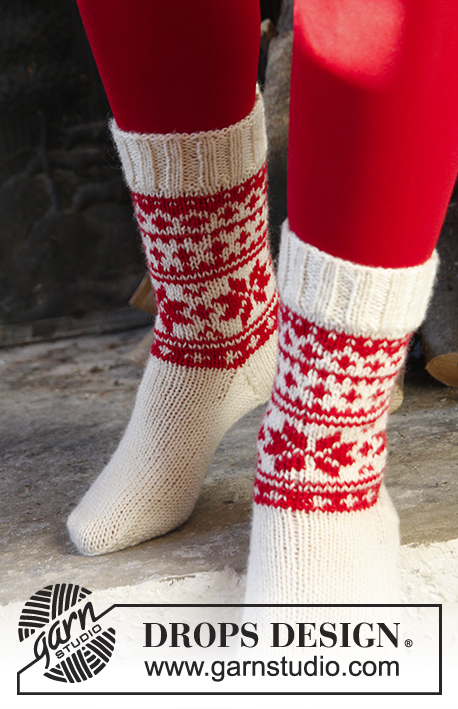 Cheerful Steps / DROPS Extra 0-1202 - DROPS Kerst: gebreide DROPS sokken met Noors patroon van ”Karisma”. Maat 32-43