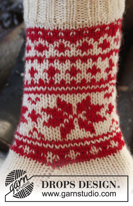 Cheerful Steps / DROPS Extra 0-1202 - DROPS Christmas: Knitted DROPS socks with Nordic pattern in ”Karisma”. Size 32-43