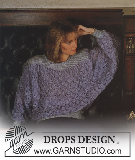 DROPS Extra 0-131 - DROPS sweater with lace pattern in “Toscana” and borders in “Silke”. Size S-M.