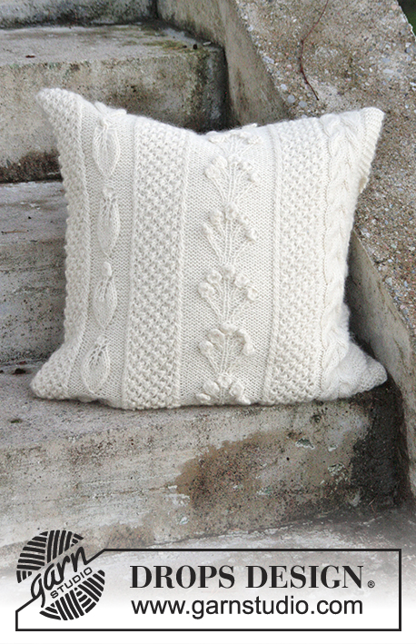 Snow Beads Pillow / DROPS Extra 0-1315 - Knitted DROPS pillow case with different patterns in Alpaca and “Brushed Alpaca Silk”.