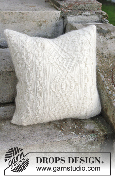 Irish Winter Pillow / DROPS Extra 0-1316 - Gebreide kussenhoes met kabels van 2 draden DROPS Alpaca.