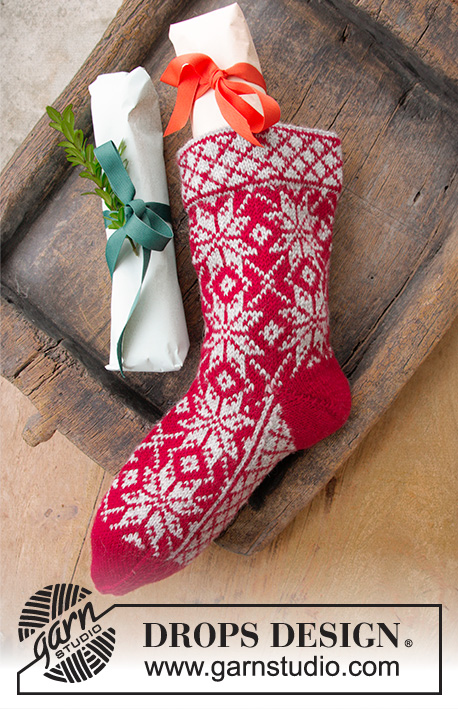 Nick's Sock / DROPS Extra 0-1393 - Gestrickter Weihnachtsstrumpf mit mehrfarbigem Norwegermuster für Weihnachten. Die Arbeit wird gestrickt in DROPS Karisma.