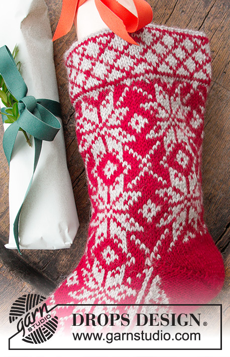 Nick's Sock / DROPS Extra 0-1393 - Stickad julstrumpa med flerfärgat nordiskt mönster till jul. Arbetet är stickat i DROPS Karisma.