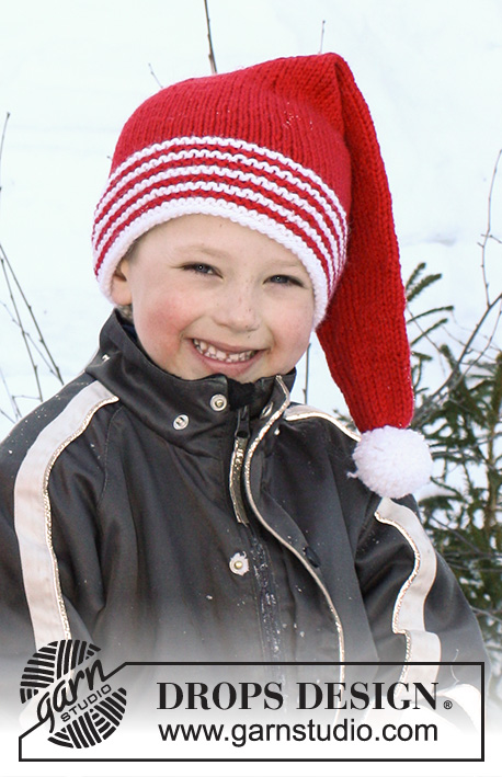Sweet Carolers / DROPS Extra 0-1395 - Cappello per bambini lavorato ai ferri in DROPS Nepal. Lavorato come un cappello di Babbo Natale con bordo a strisce. Taglie: 3 - 12 anni. Tema: Natale