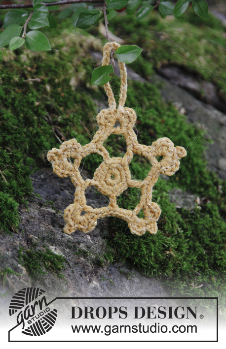 Golden Star / DROPS Extra 0-1415 - Crocheted star for Christmas. Piece is crocheted in 1 strand DROPS Nord and 2 strands DROPS Glitter.