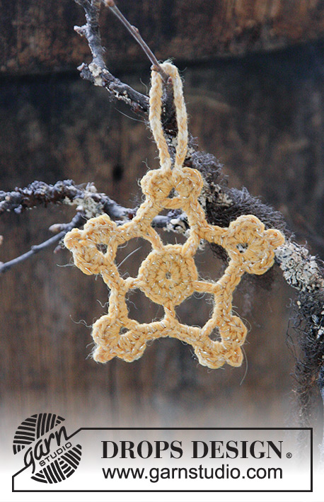 Golden Star / DROPS Extra 0-1415 - Crocheted star for Christmas. Piece is crocheted in 1 strand DROPS Nord and 2 strands DROPS Glitter.