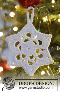 Snow Rose / DROPS Extra 0-1480 - Crocheted star in DROPS Muskat. Theme: Christmas.