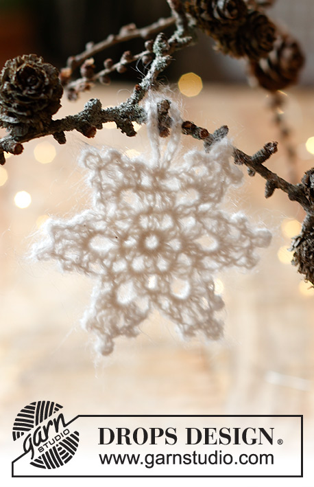 Frozen Star / DROPS Extra 0-1590 - Gwiazdka płatek śniegu na szydełku, 2 nitkami włóczki DROPS Kid-Silk. Temat: Boże Narodzenie.