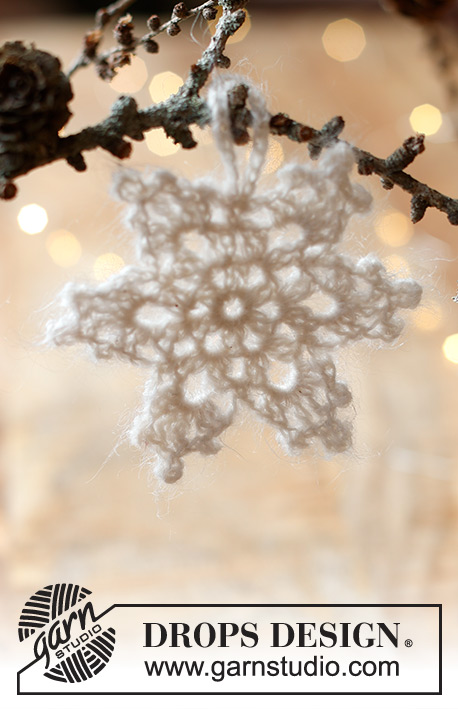 Frozen Star / DROPS Extra 0-1590 - Étoile flocon de neige crocheté avec 2 fils DROPS Kid-Silk. Thème: Noël.