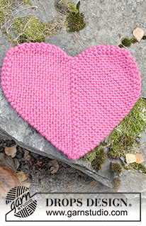 Heart Seatpad / DROPS Extra 0-1621 - Stickat sittunderlag / hjärta till barn i 2 trådar DROPS Snow. Arbetet stickas fram och tillbaka som en dominoruta med halvcirklar på 2 av sidorna. Tema: Valentine.