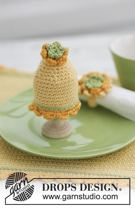 Buongiorno / DROPS Extra 0-544 - Crochet DROPS place mat, egg warmer and serviette ring for your Easter lunch in ”Paris”.
