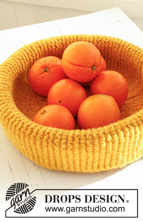 Sunshine Basket / DROPS Extra 0-767 - Felted DROPS Easter fruit basket in 2 strands ”Snow”.