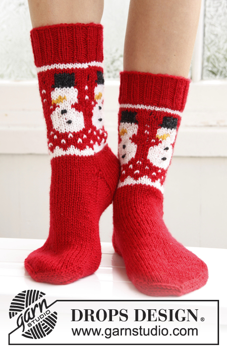 Frosty Feet / DROPS Extra 0-786 - Knitted DROPS socks with Christmas pattern in ”Karisma”. 