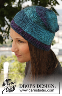 DROPS Extra 0-882 - Knitted DROPS hat with domino pattern in Delight.  