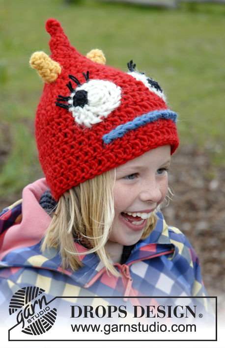 DROPS Extra 0-928 - Crochet monster hat for children in DROPS Eskimp. Hat is worked with horns, eyes and mouth. Size 3 - 14 years.