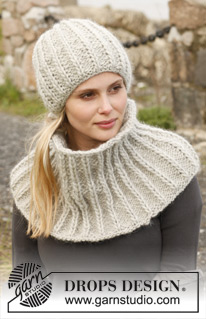 Winter Charm / DROPS Extra 0-952 - Knitted DROPS hat and neck warmer with false fisherman’s rib  in ”Snow”.