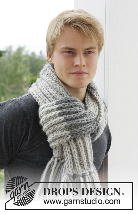 Fishtails / DROPS Extra 0-970 - Knitted scarf for men in DROPS Snow, with fringes, false fisherman's rib variation
