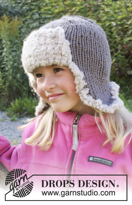 Ushanka / DROPS Extra 0-975 - DROPS hat with ear flaps in ”Andes” and crochet edge and flap in ”Alpaca Bouclé ”. 
Size: 3-12 years

