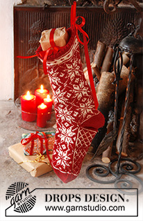 Mr. Kringle's Stocking / DROPS Extra 0-986 - DROPS Christmas: Knitted DROPS Christmas stocking with Norwegian pattern in ”Karisma”. 
