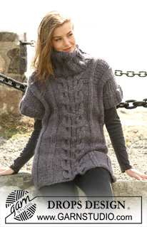 DROPS 102-35 - Long DROPS blouse in ”Snow” with cables and Rib. Sizes S - XXXL