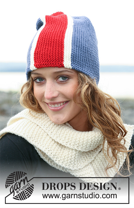 Wear Your Colours / DROPS 110-46 - Bonnets DROPS Drapeaux en Karisma, tricotés de côté. À tricoter également en Merino. Écharpe en Alaska