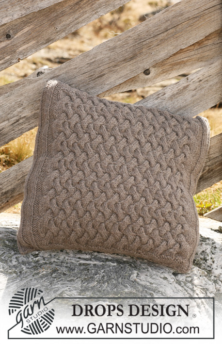 Spring Beats / DROPS 117-49 - Knitted DROPS cushion cover with cables in ”Alaska”.
