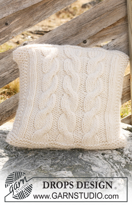 Three Across / DROPS 117-53 - Knitted DROPS cushion cover with cables in ”Polaris”.