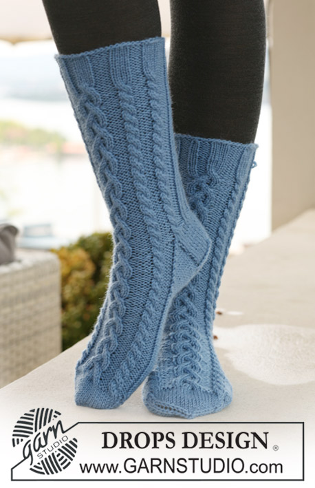 Twirls and Braids / DROPS 121-16 - Knitted DROPS Socks with cables in ”Karisma”.