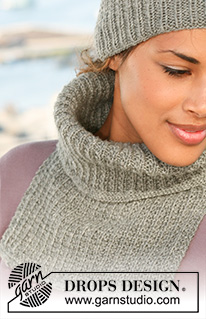 Silver Cuddle / DROPS 122-39 - Set comprises: DROPS hat and neck warmer in textured pattern in ”Karisma”.