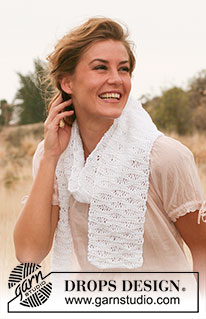 Fleur de Sel / DROPS 127-31 - Knitted DROPS scarf with lace pattern in Bomull-Lin. 