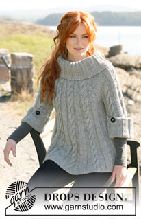 Jackie / DROPS 131-1 - Knitted DROPS jumper or tunic with cables, ¾ sleeves and large, wide collar in ”Nepal”. 
Size: XS to XXXL.
