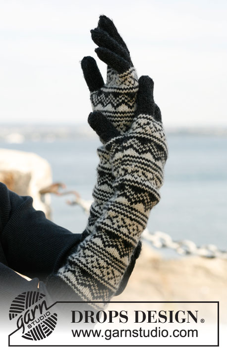 Nordic Night / DROPS 131-14 - Knitted DROPS gloves with Norwegian pattern in ”Karisma”. 