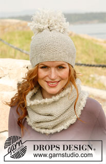 Sweetie / DROPS 131-30 - Set consists of: Knitted DROPS hat with pompom and neck warmer with crochet border in “Nepal” and “Puddel”. 