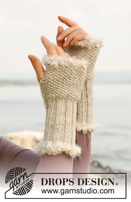 Elegance / DROPS 131-31 - Knitted DROPS wrist warmers in ”Nepal” with crochet edges in “Puddel”. 