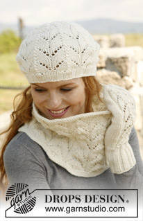 Florence / DROPS 131-35 - Knitted DROPS neck warmer, mittens and hat with lace pattern in ”Nepal”. 
