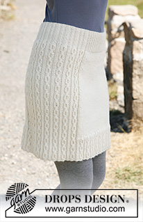Belle / DROPS 131-5 - Knitted DROPS skirt with cable pattern in ”Karisma”. 
Size: S - XXXL.

