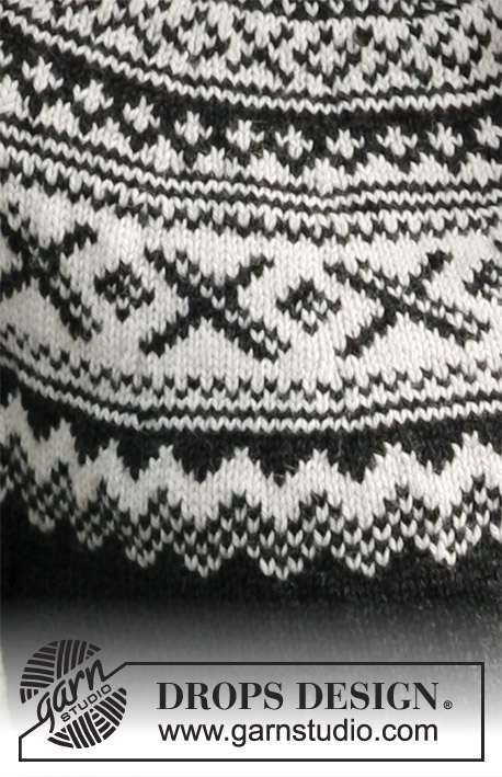 Neville / DROPS 135-4 - Męski sweter na drutach z zaokrąglonym karczkiem i żakardem norweskim z włóczki DROPS Karisma. Rozmiary S-XXXL.