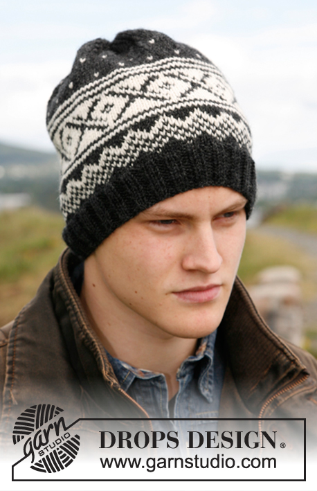 Reynald / DROPS 135-6 - Męska czapka na drutach z żakardem norweskim z włóczki DROPS Karisma. 