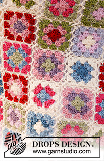 Springtime / DROPS 137-1 - Couverture DROPS composée de carrés « granny » au crochet, en Merino Extra Fine.