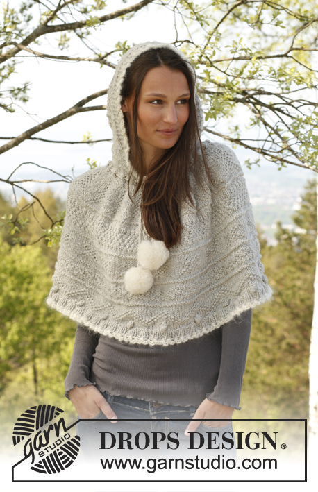 Smilla / DROPS 141-22 - Knitted DROPS poncho with textured pattern and hood in ”Nepal”. Pompoms and crochet edges in Vienna. 
Size: S - XXXL
