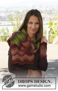 Autumn Set / DROPS 142-28 - Knitted DROPS hat and neck warmer with wavy pattern in ”Big Delight”.