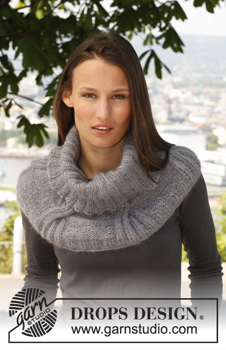 Little Cloud / DROPS 142-33 - Knitted DROPS shoulder warmer with cables in 2 strands Kid Silk. 