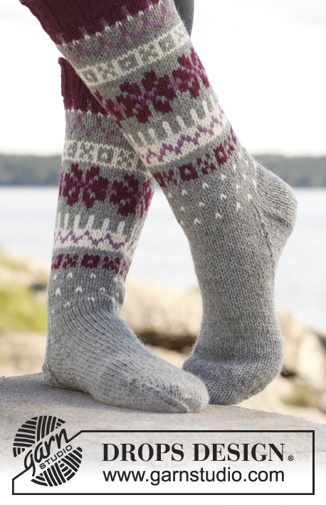 September Socks / DROPS 150-18 - DROPS ponožky s norským vzorem pletené z příze Lima. 
