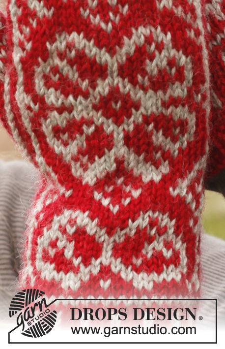 Winter Rose Gloves / DROPS 150-3 - Knitted DROPS mittens with Nordic pattern in ”Karisma”.
