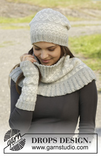 Silver Dream Set / DROPS 157-9 - Knitted DROPS hat, neck warmer and wrist warmers with Norwegian pattern in ”Karisma”.