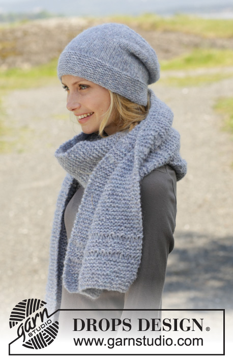 Serene Skies / DROPS 158-43 - Knitted DROPS hat and scarf in garter st with dropped sts in ”Air” or “Brushed Alpaca Silk” or in 2 threads in Alpaca.